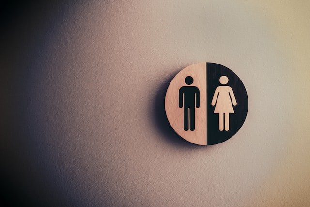 gender icons on wall by Tim Mossholder/Unsplash