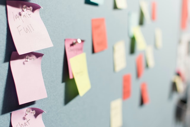 sticky notes on wall by Patrick Perkins/Unsplash